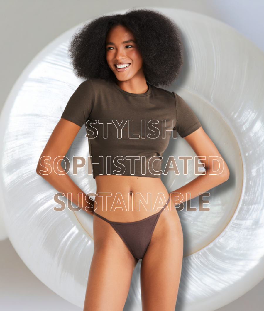 Woman wearing a brown top and underwear with text 'STYLISH', 'SOPHISTICATED', 'SUSTAINABLE' on a white background.